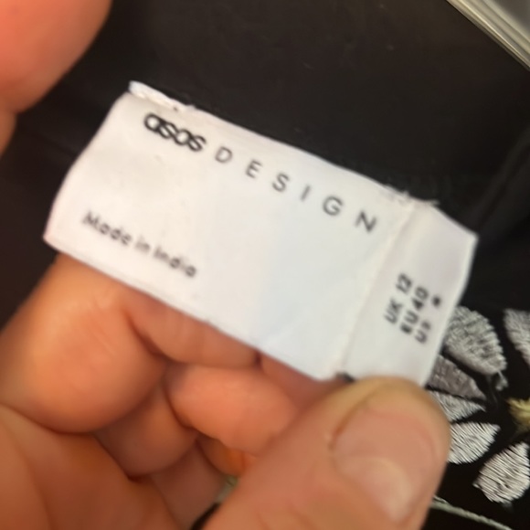 ASOS DESIGN mini swing dress with shoulder ruffle and daisy embroidery black 8 - Picture 3 of 8